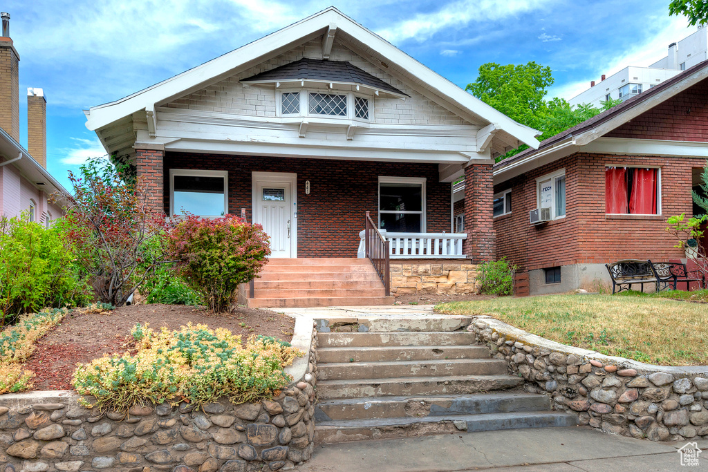 View of front of property with covered porch