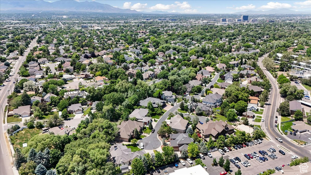 Birds eye view of property with a mountain view