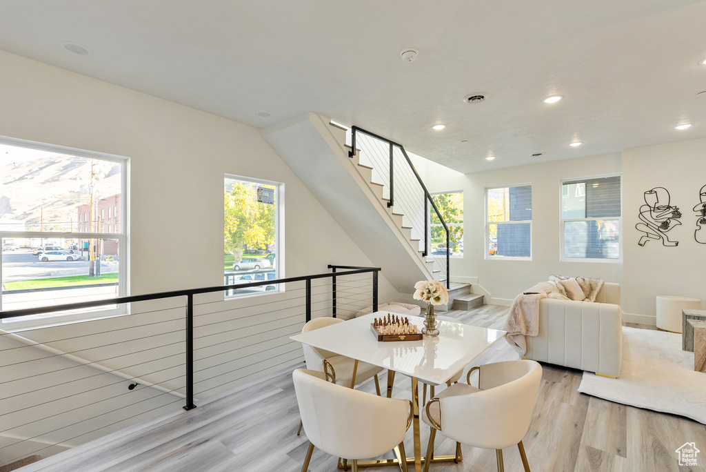 Dining space featuring light wood-type flooring