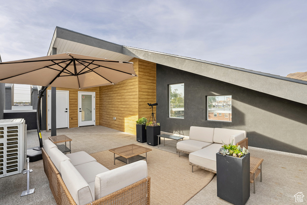 View of patio with outdoor lounge area