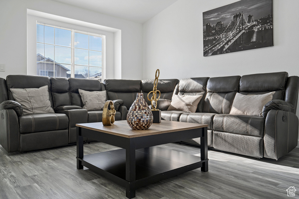 Living room with hardwood / wood-style floors