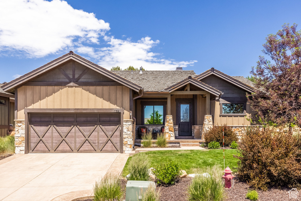 Craftsman-style home with a garage