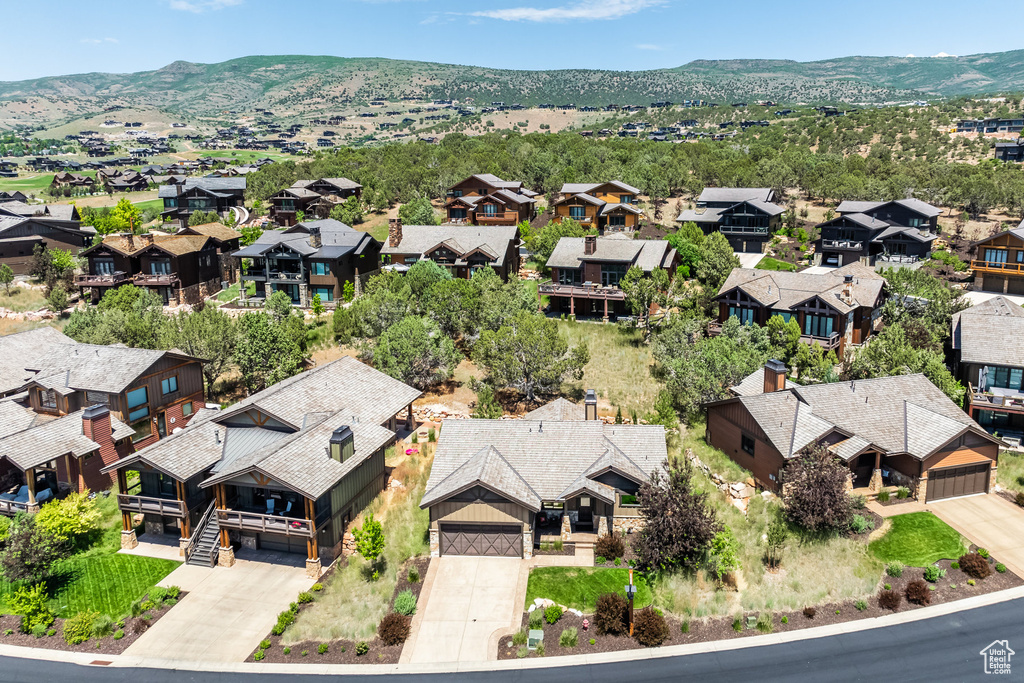 Birds eye view of property featuring a mountain view