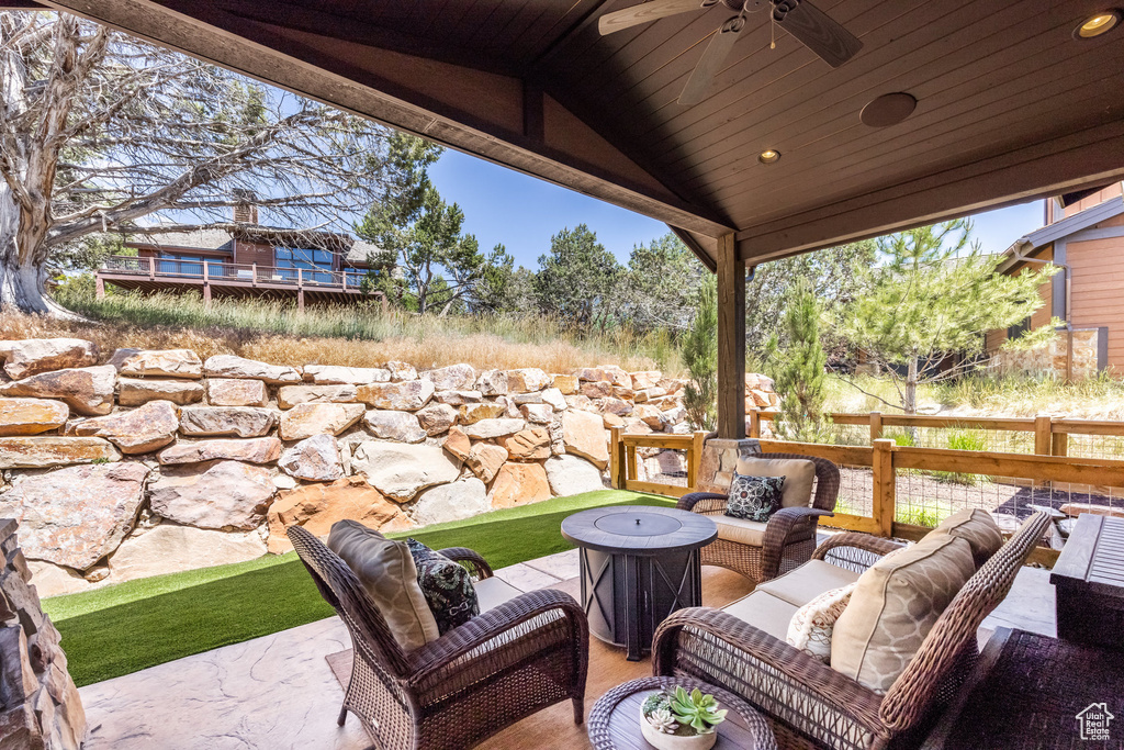 View of patio / terrace featuring ceiling fan and an outdoor hangout area