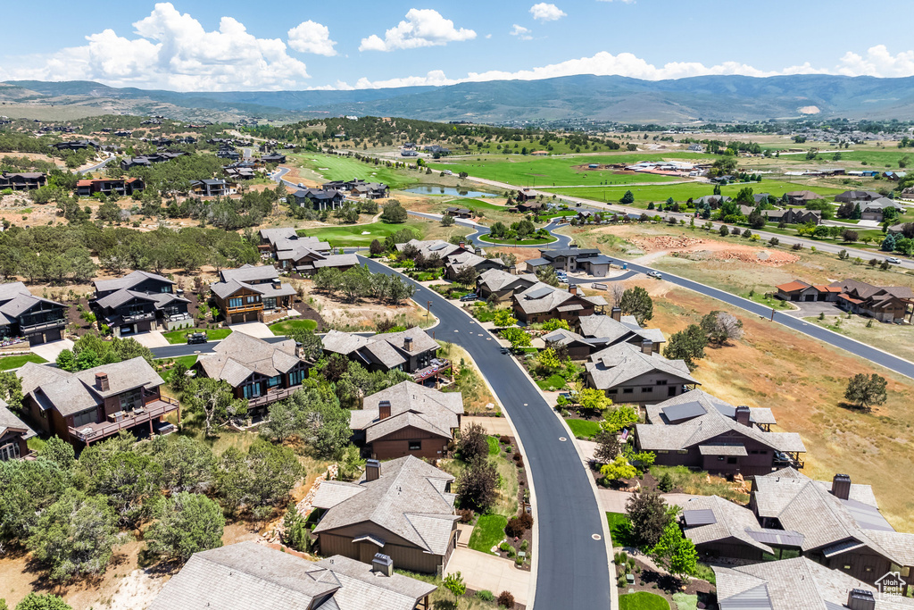 Birds eye view of property featuring a mountain view