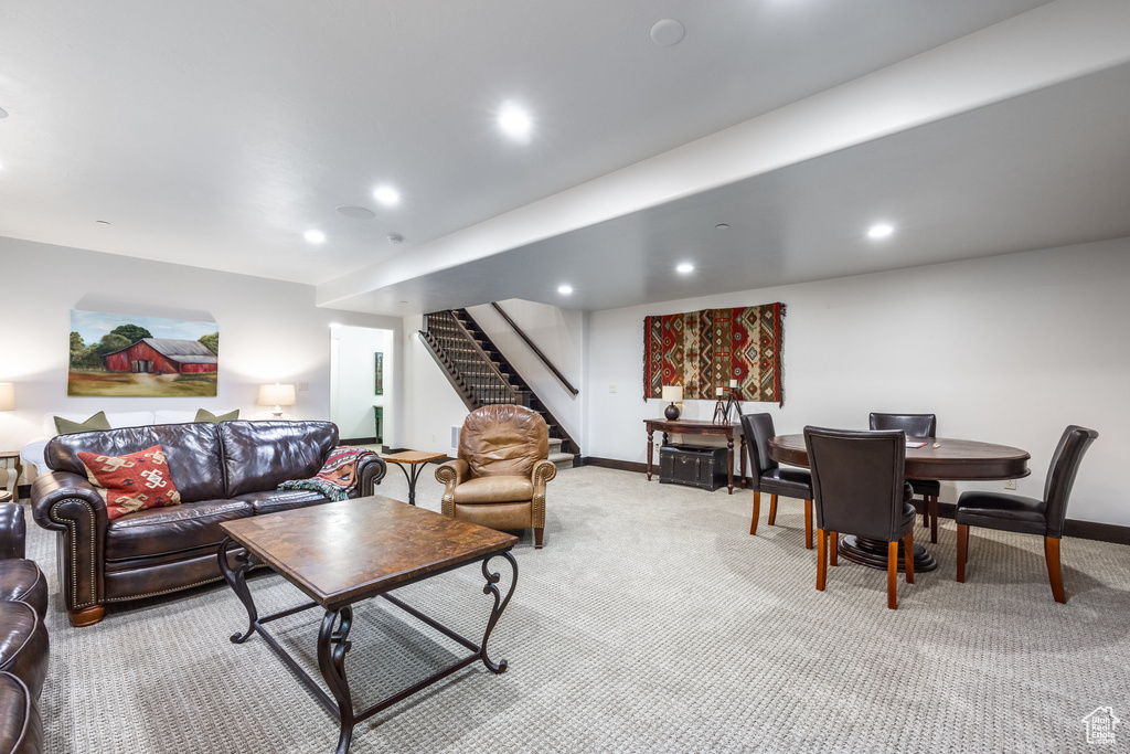 Living room featuring light carpet