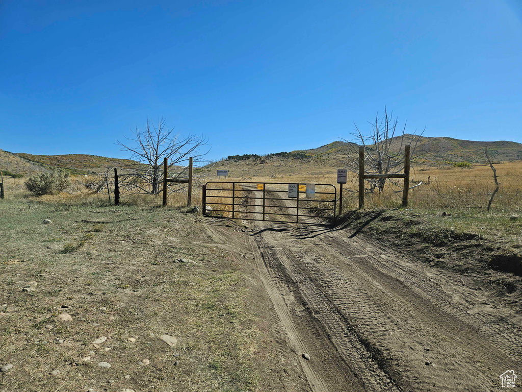 View of yard featuring a mountain view and a rural view