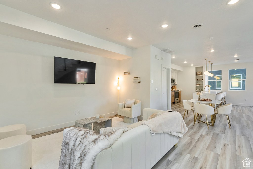 Living room featuring light hardwood / wood-style flooring