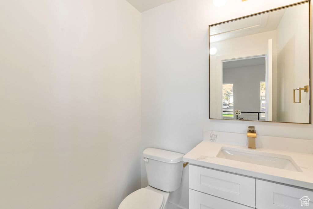 Bathroom with vanity and toilet