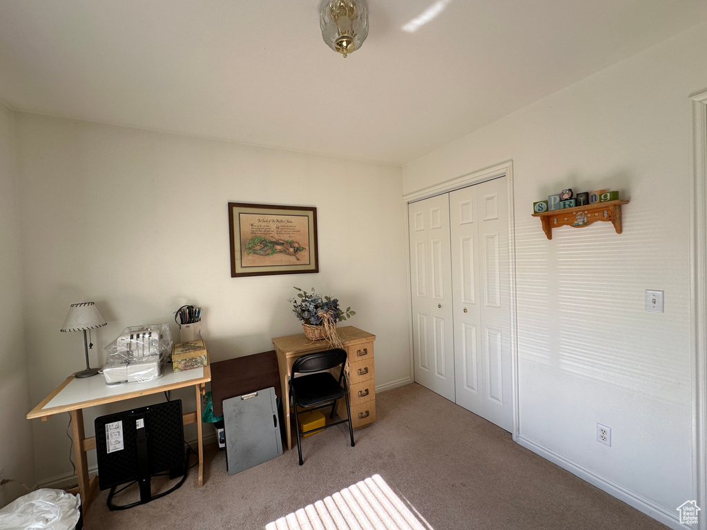 View of carpeted home office