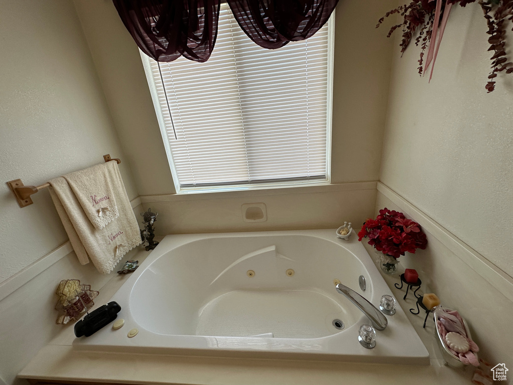 Bathroom with a washtub