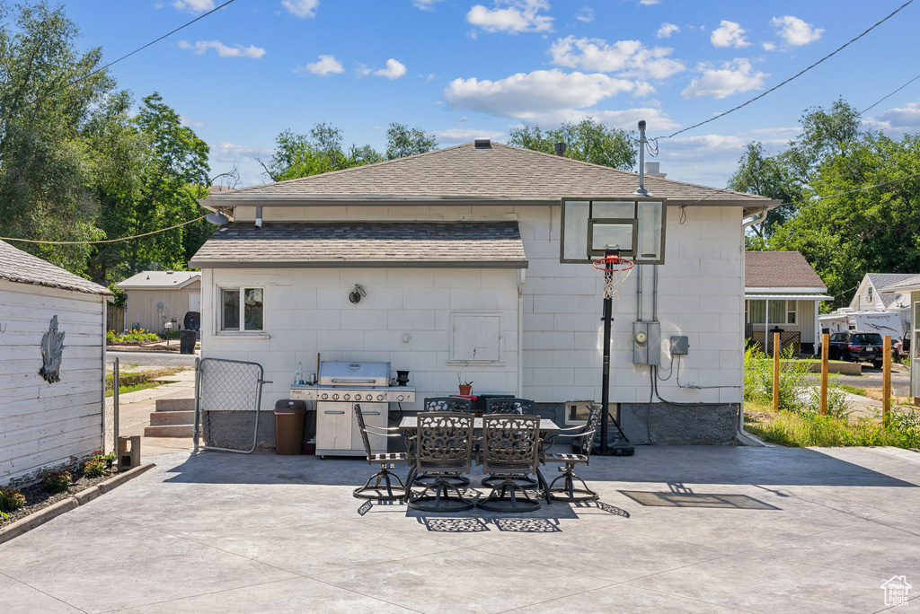 Back of property with a patio area