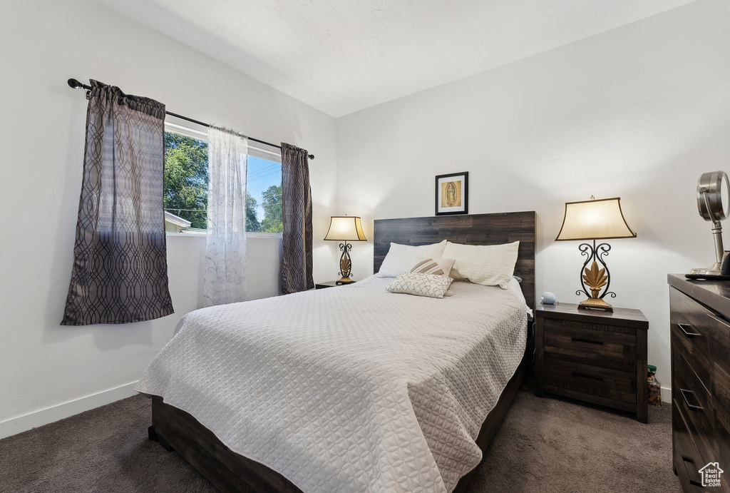 View of carpeted bedroom