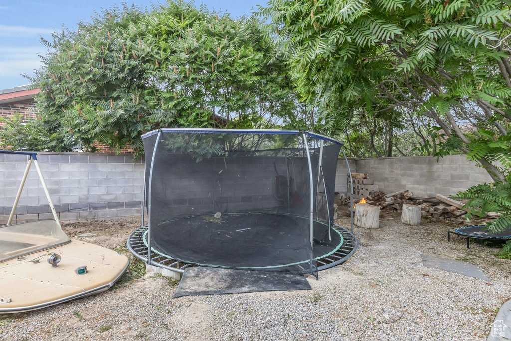 Exterior space with a trampoline