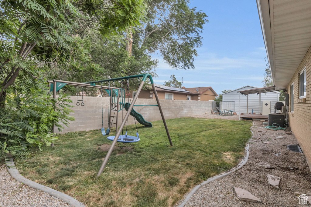 View of yard featuring a playground