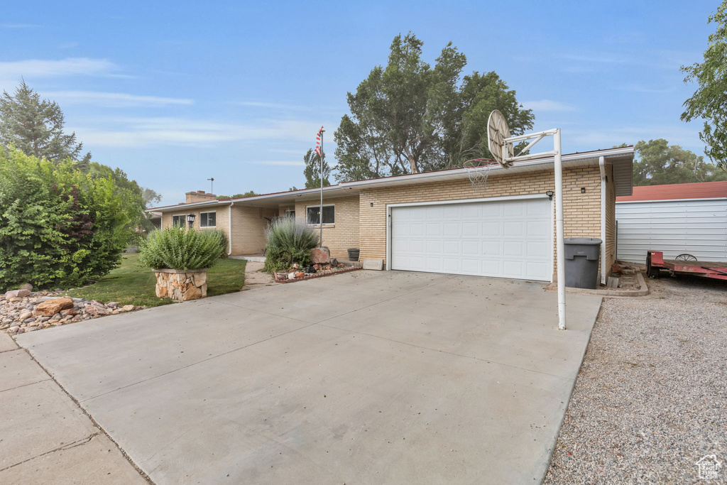 Single story home featuring a garage