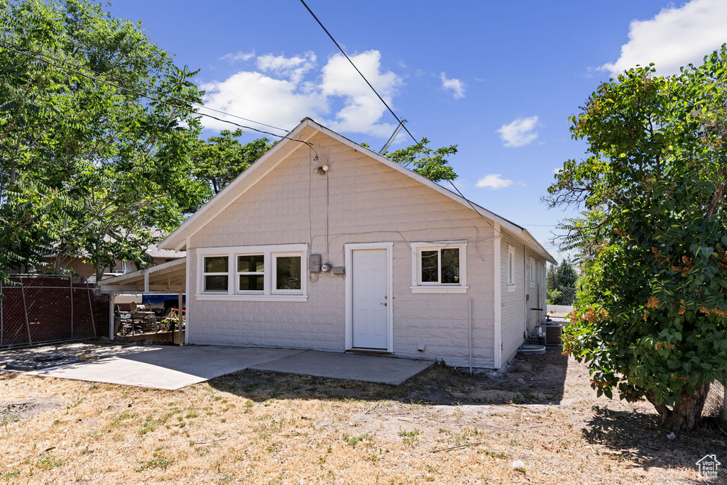 View of front of property with a patio