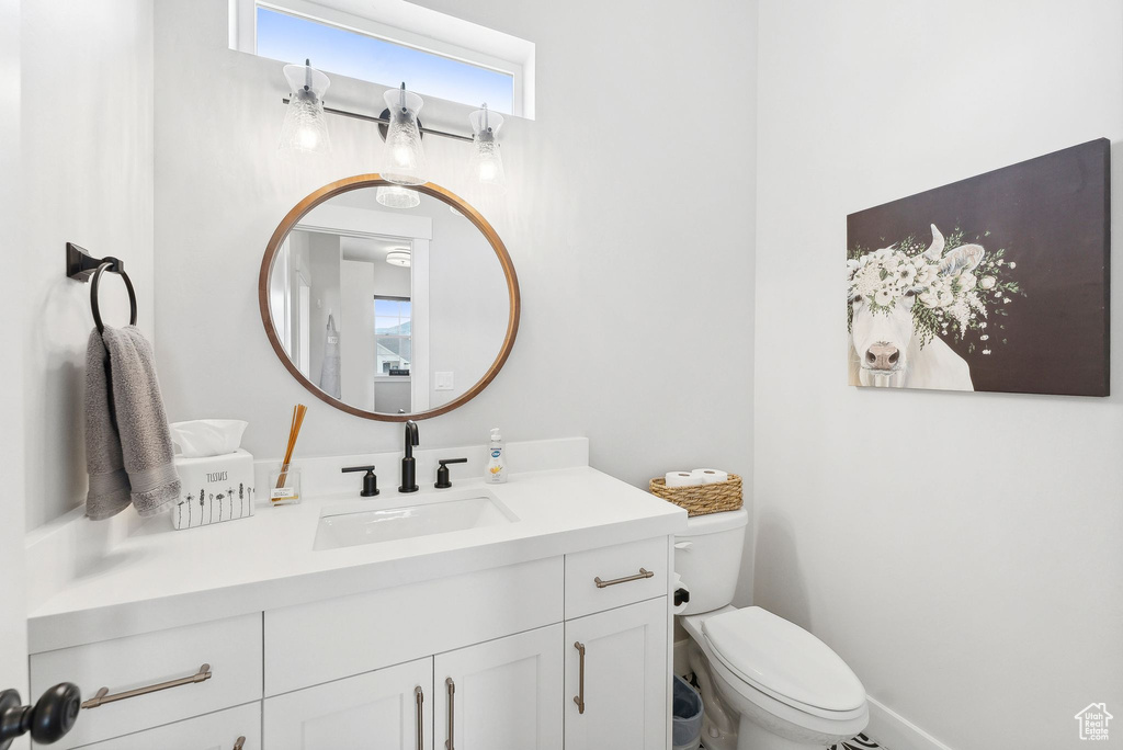 Bathroom with vanity and toilet