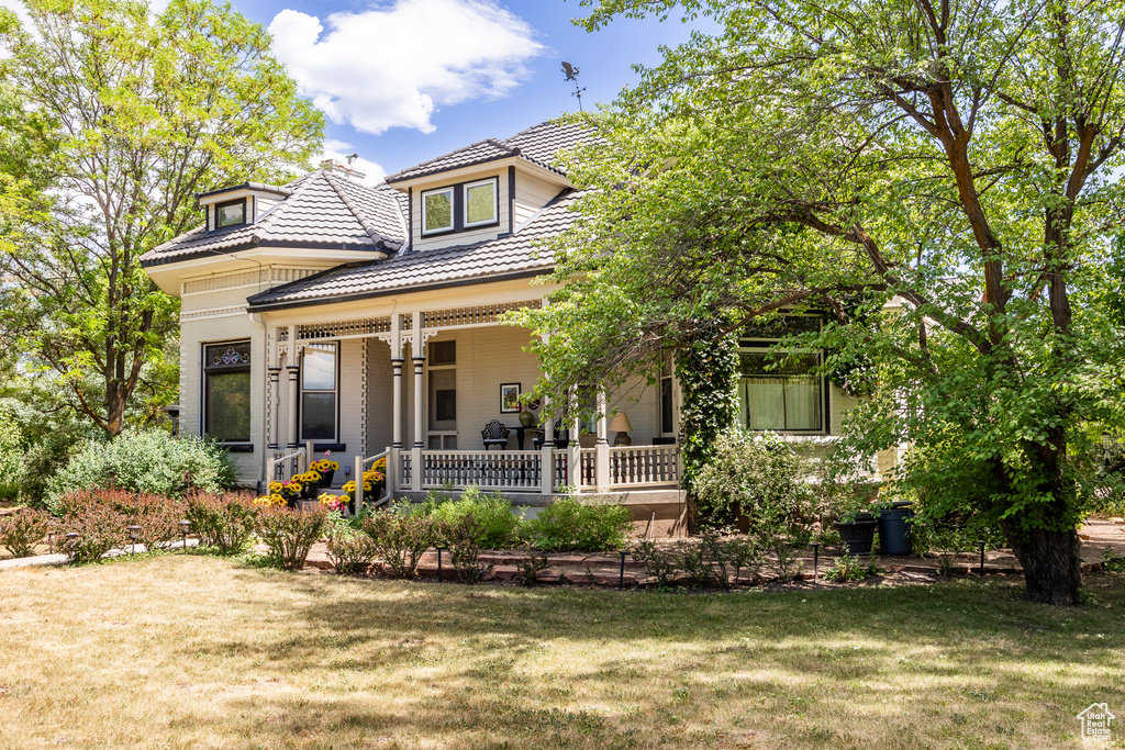 Exterior space featuring a front yard