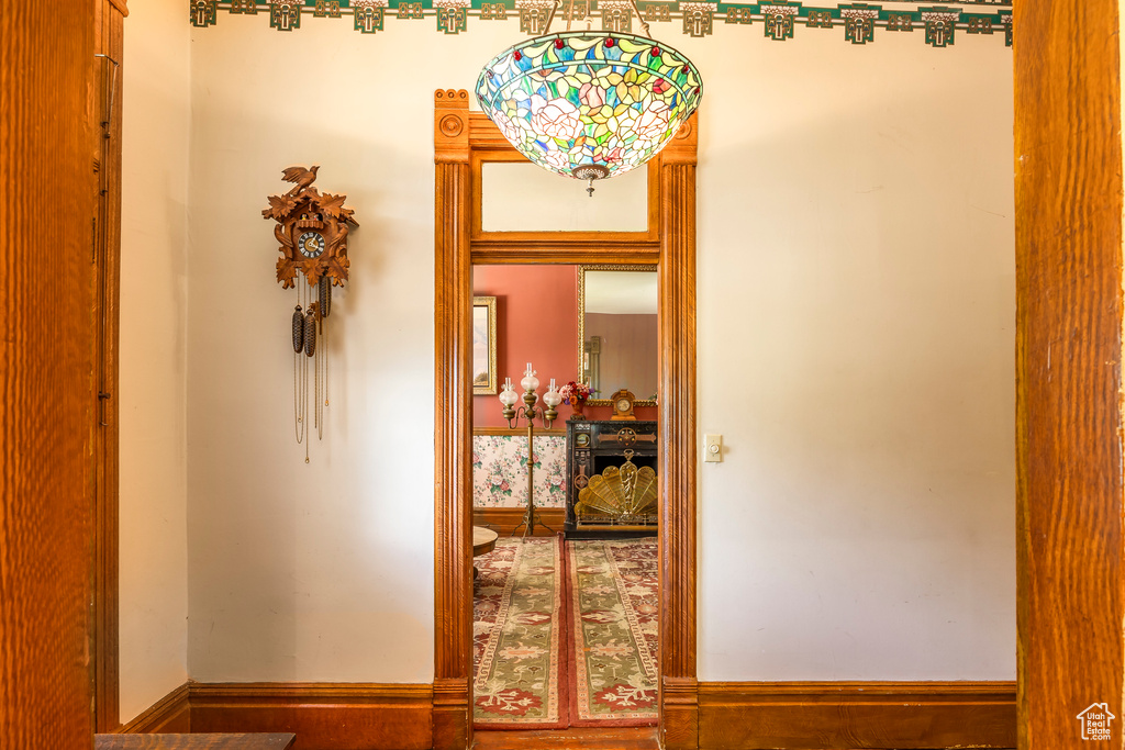 Corridor featuring hardwood / wood-style flooring