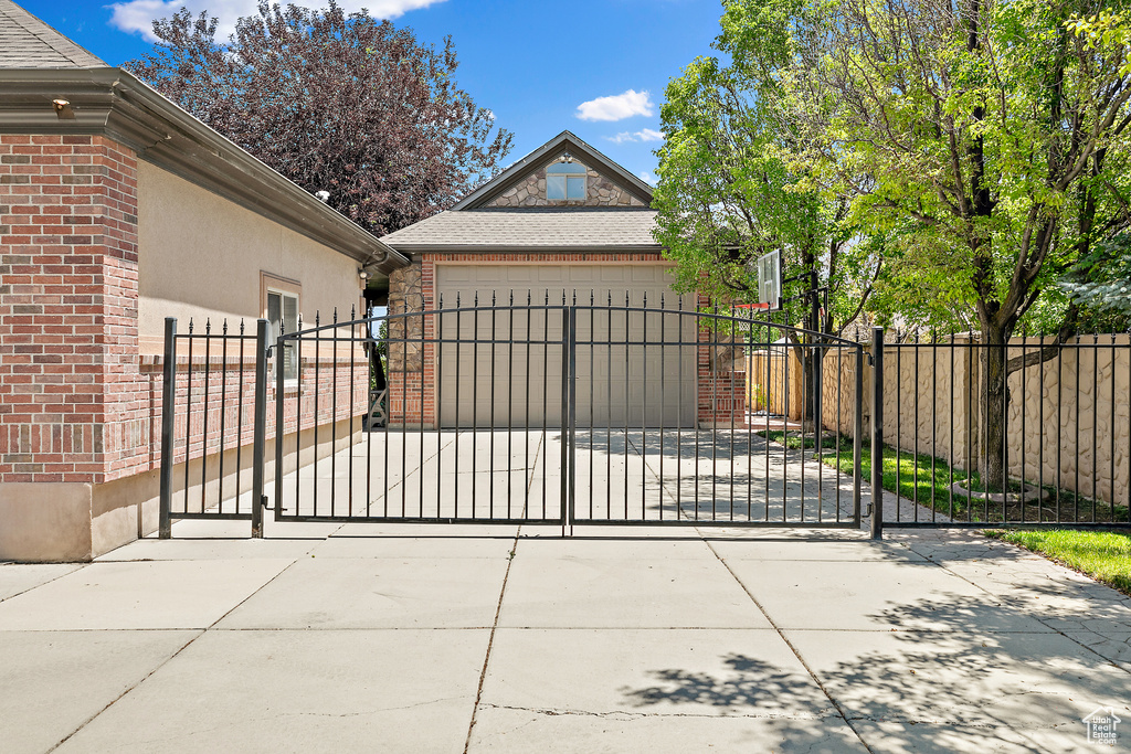 View of gate featuring a garage