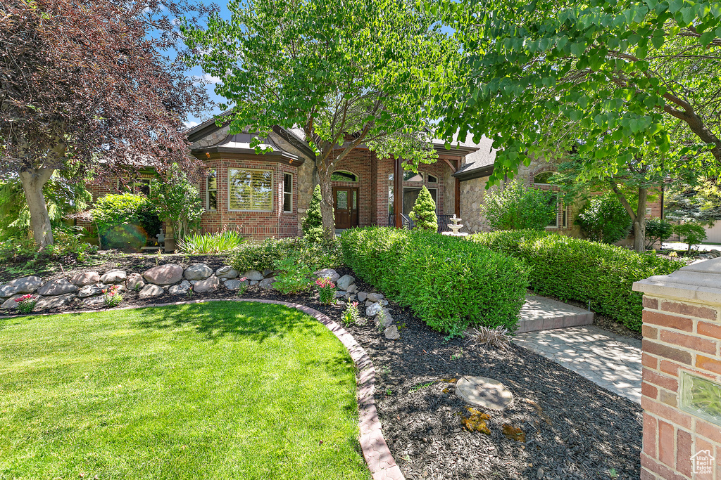 View of front of home with a front yard