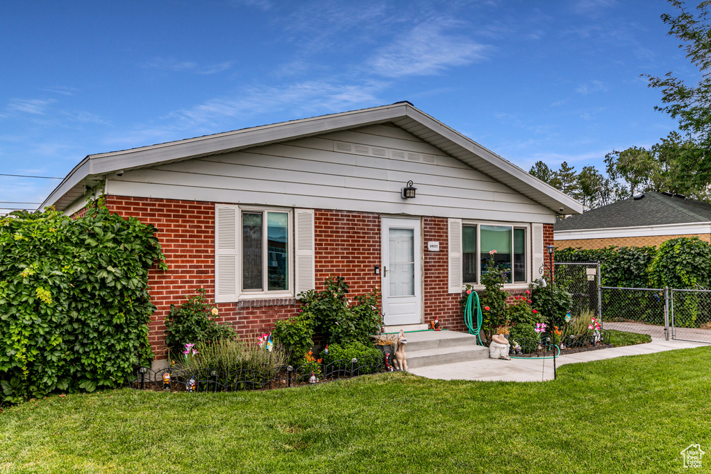 View of front of home with a front yard