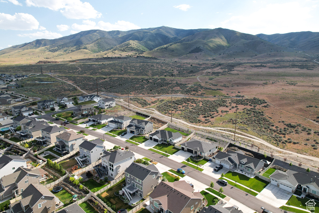 Birds eye view of property with a mountain view