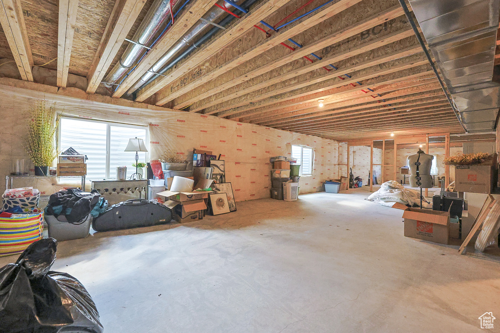 Basement featuring a wealth of natural light