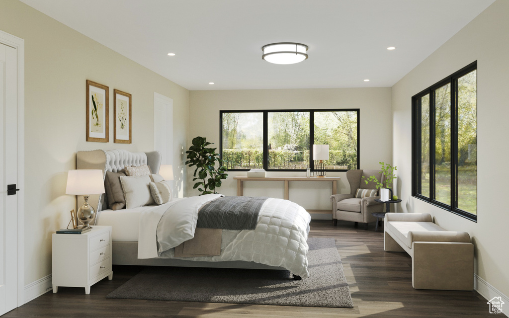 Bedroom with dark hardwood / wood-style flooring