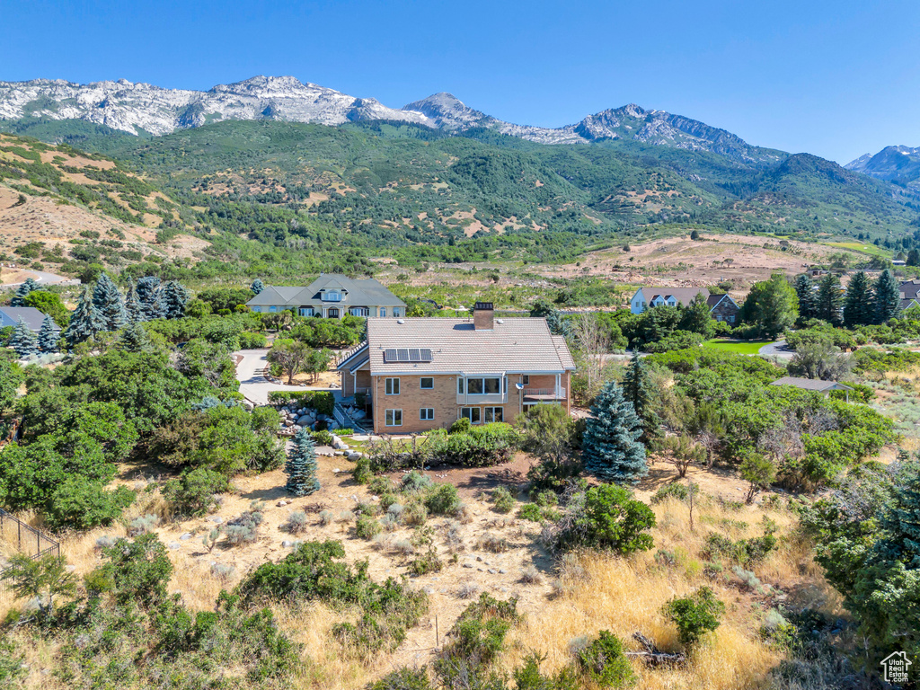 Exterior space featuring a mountain view