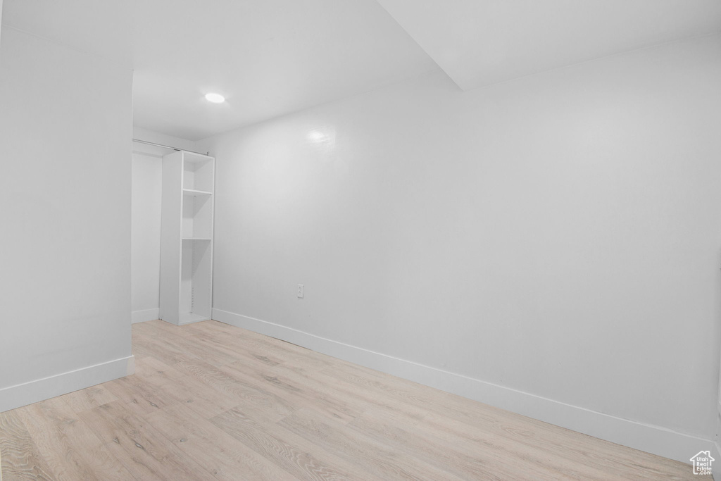 Empty room featuring light wood-type flooring