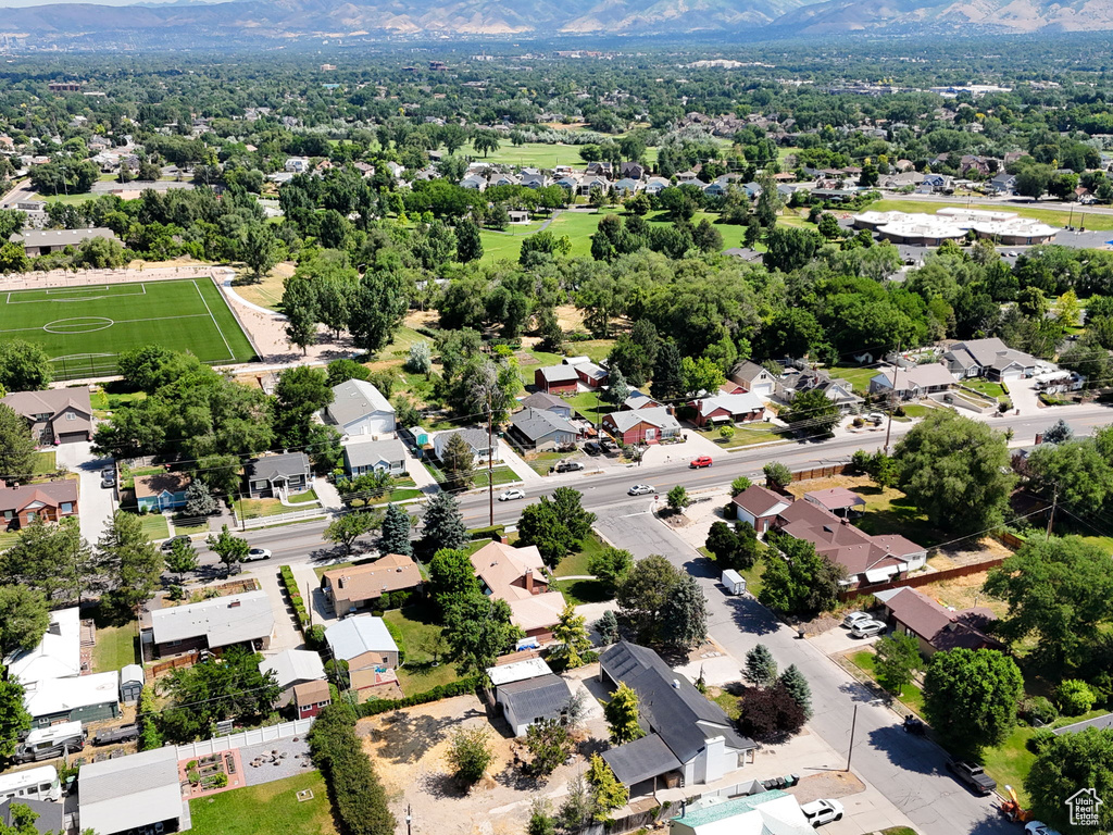 Birds eye view of property featuring a mountain view