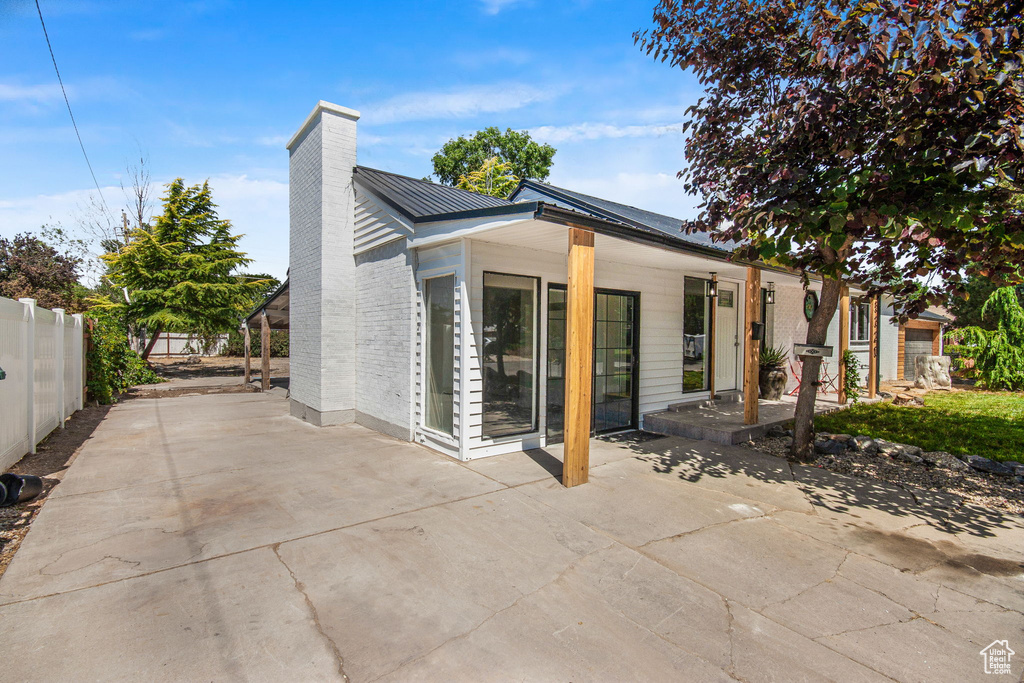 View of home\'s exterior featuring a patio