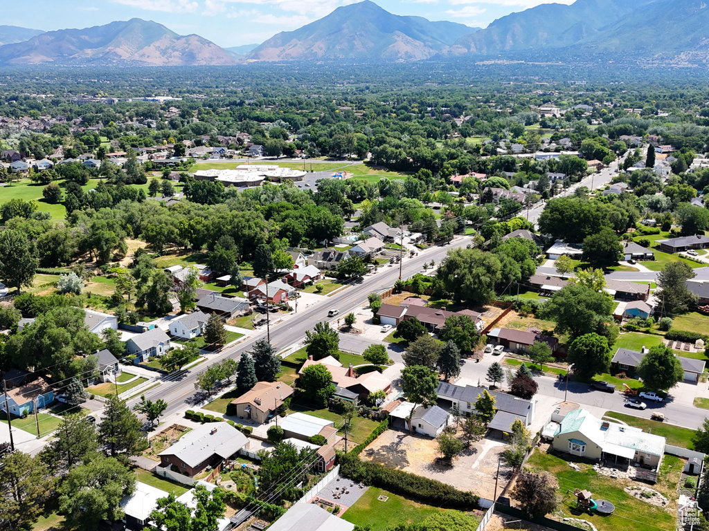 Birds eye view of property with a mountain view