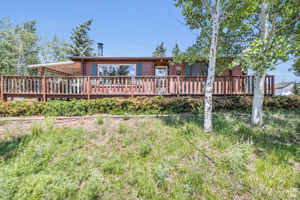 Exterior space with a wooden deck