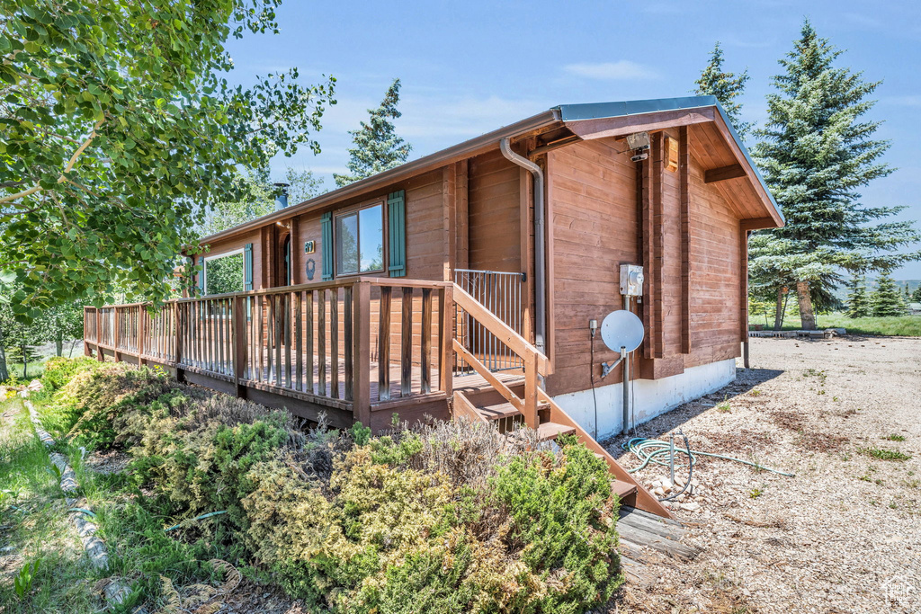 View of front of property with a deck