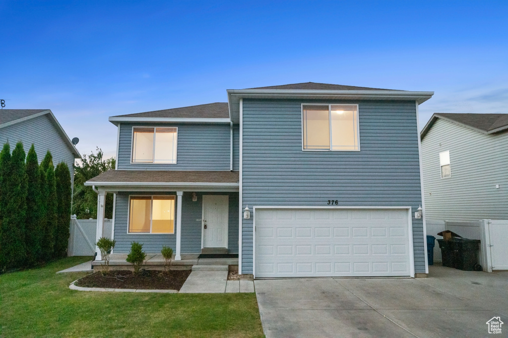 View of front of home featuring a garage