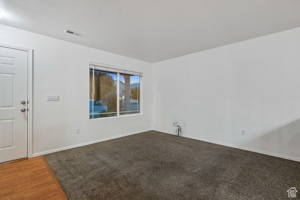 Spare room with light hardwood / wood-style floors