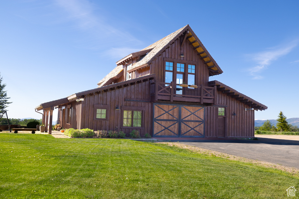 Exterior space with a front yard