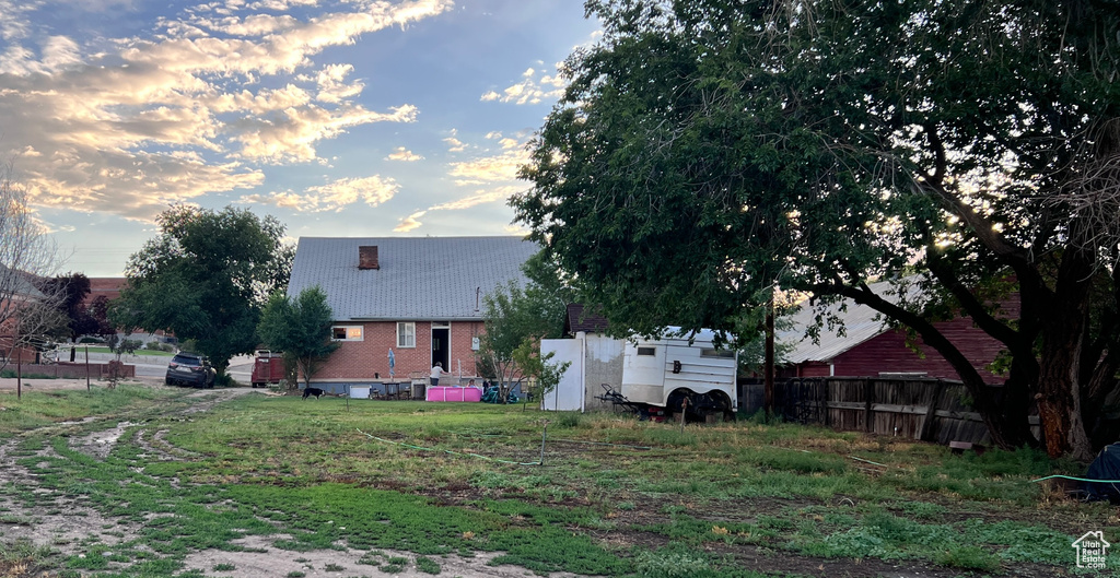 View of yard at dusk