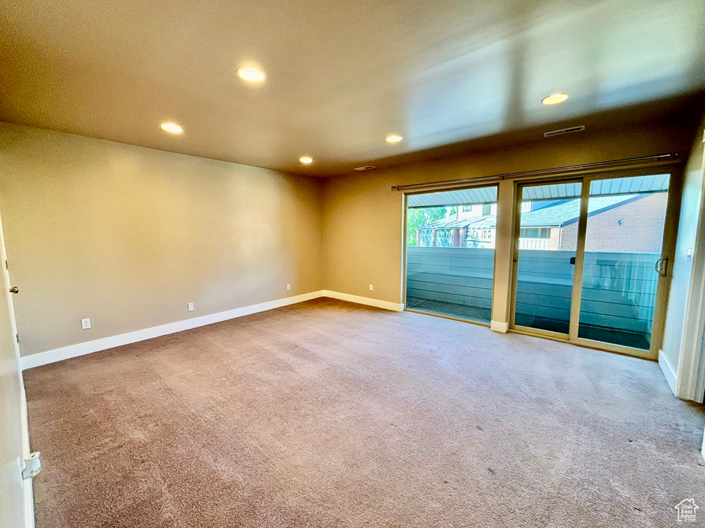 View of carpeted spare room