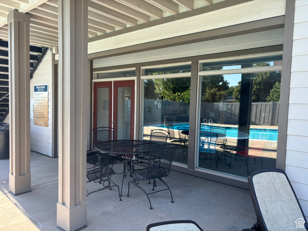 View of terrace featuring a community pool