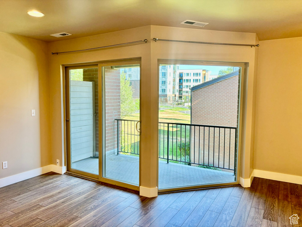 Entryway with hardwood / wood-style flooring