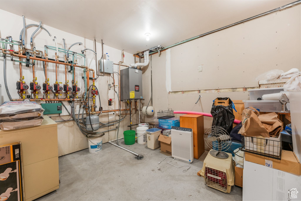 Utility room with tankless water heater