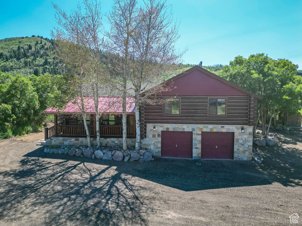 View of front of property with a garage