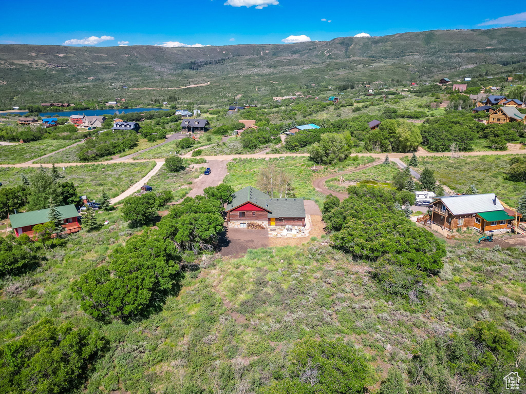 Birds eye view of property featuring a mountain view