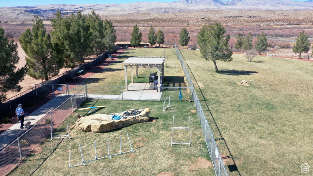 Birds eye view of property with a rural view