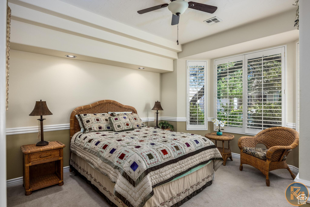 Bedroom featuring carpet floors and ceiling fan