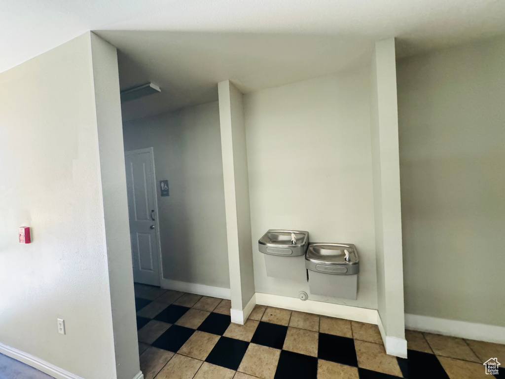 Bathroom with tile flooring